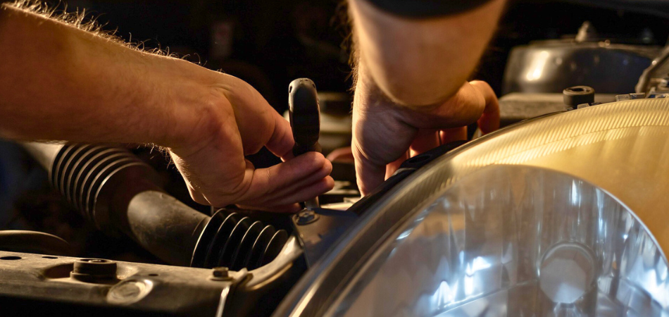 Mechanic fixing a car